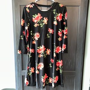 Women’s floral dress with the back cut out stretchy size medium
